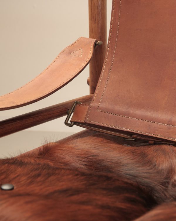Recrafted lounge chair from Design Preowned, restored usingleather with circular and sustainable design focus.